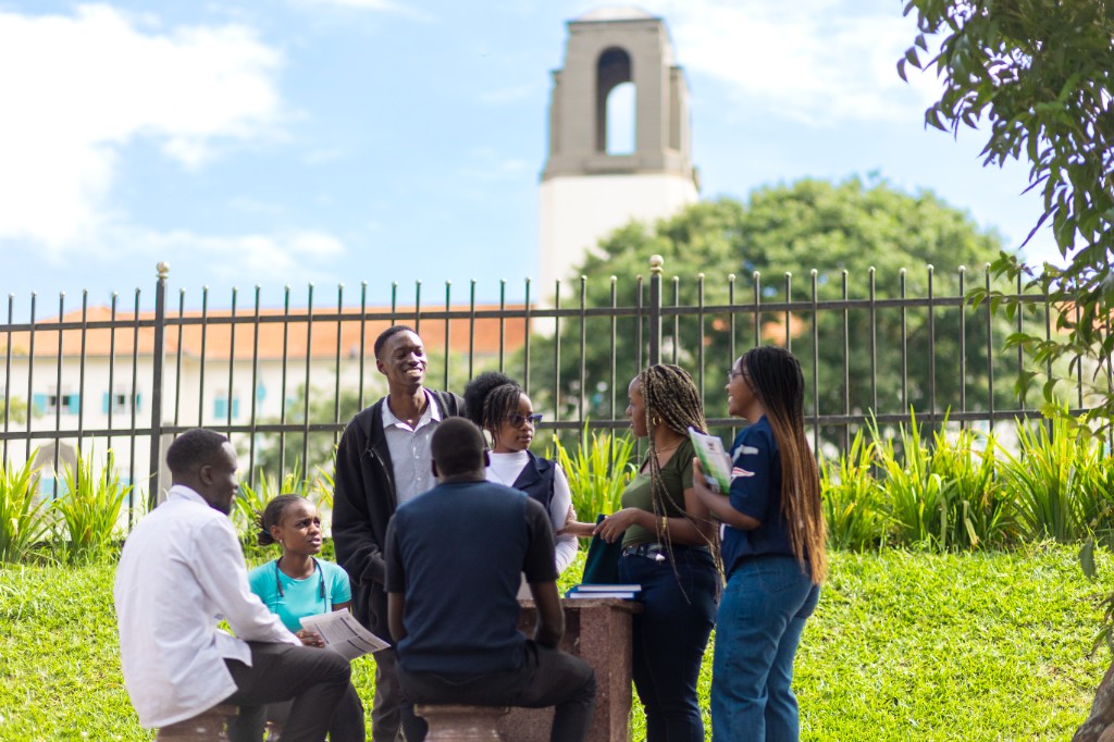 Students at the Main Building clock tower