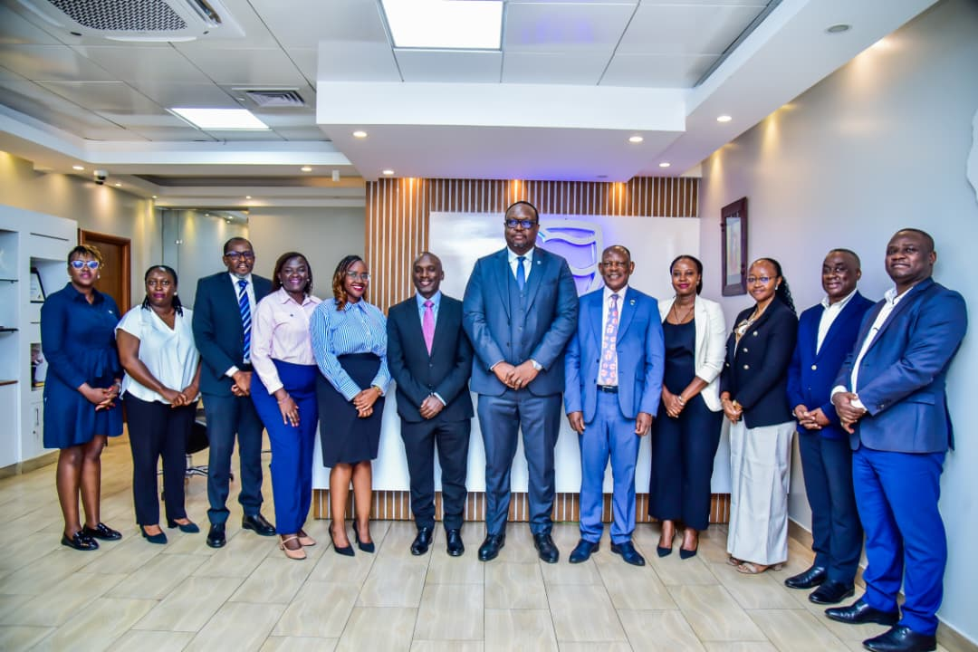 A photo showing the meeting delegation from Stanbic Bank Uganda and Makerere University. 